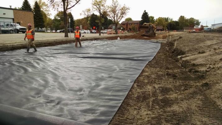 Laying fabric for roadway preparation 